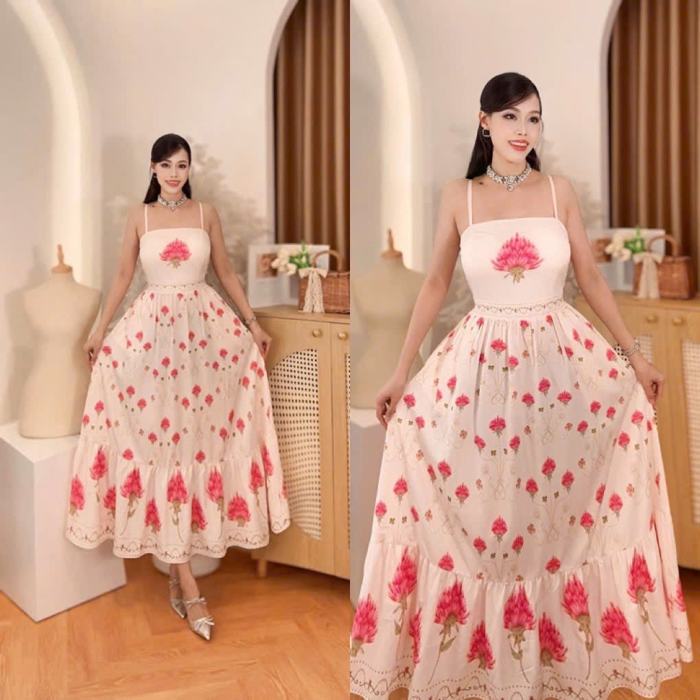 Vietnam Pink Tropical Floral Spaghetti Strap Maxi Dress displayed on a model in a stylish interior.