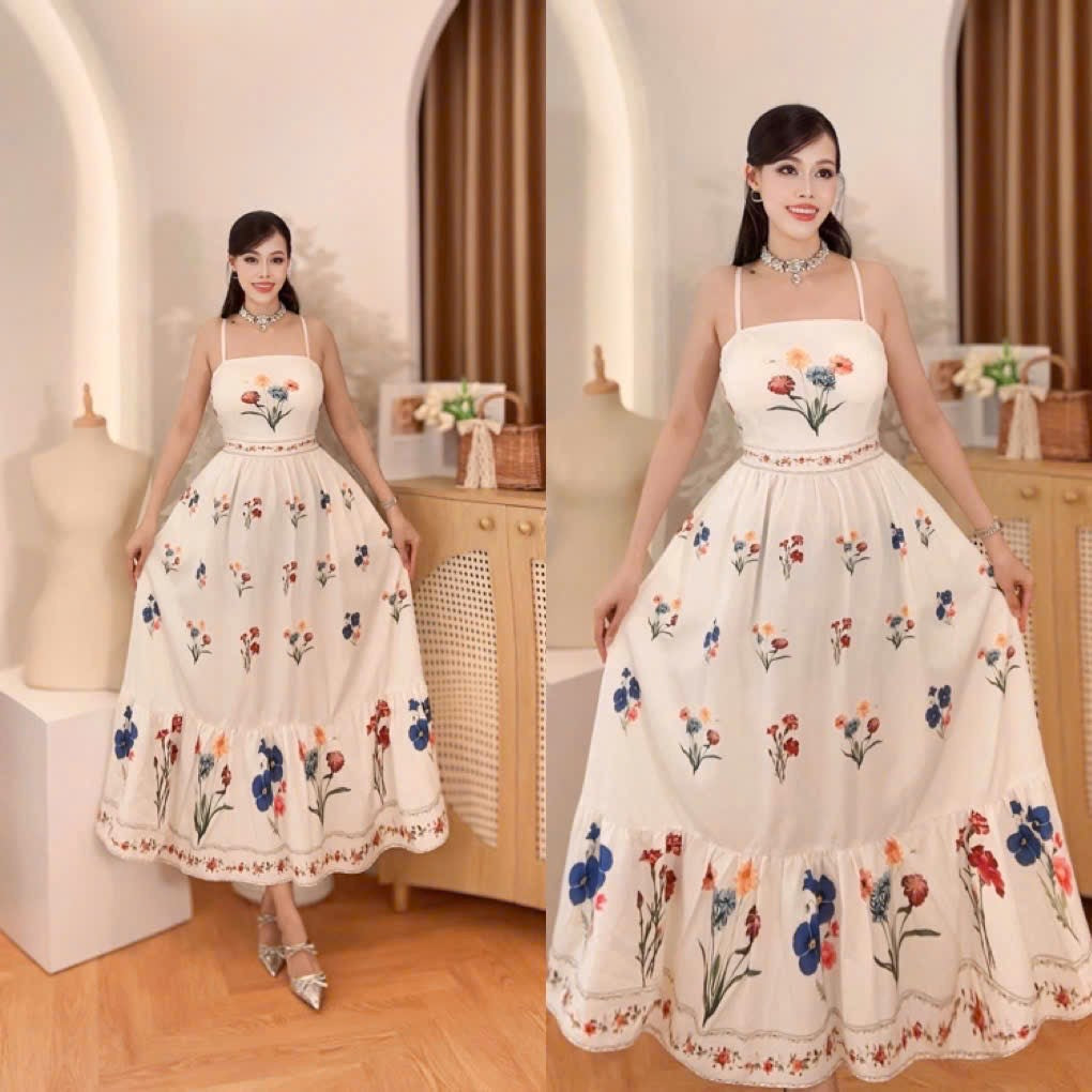 Vietnam White Spaghetti Strap Floral Tiered Maxi Dress displayed on a model in an elegant setting.