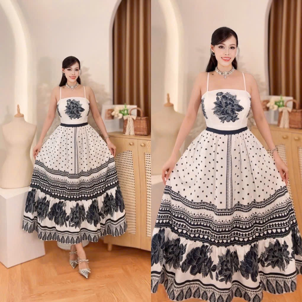 Monochrome Black & White Boho-Chic Maxi Dress displayed on a model, featuring floral patterns and polka dots.