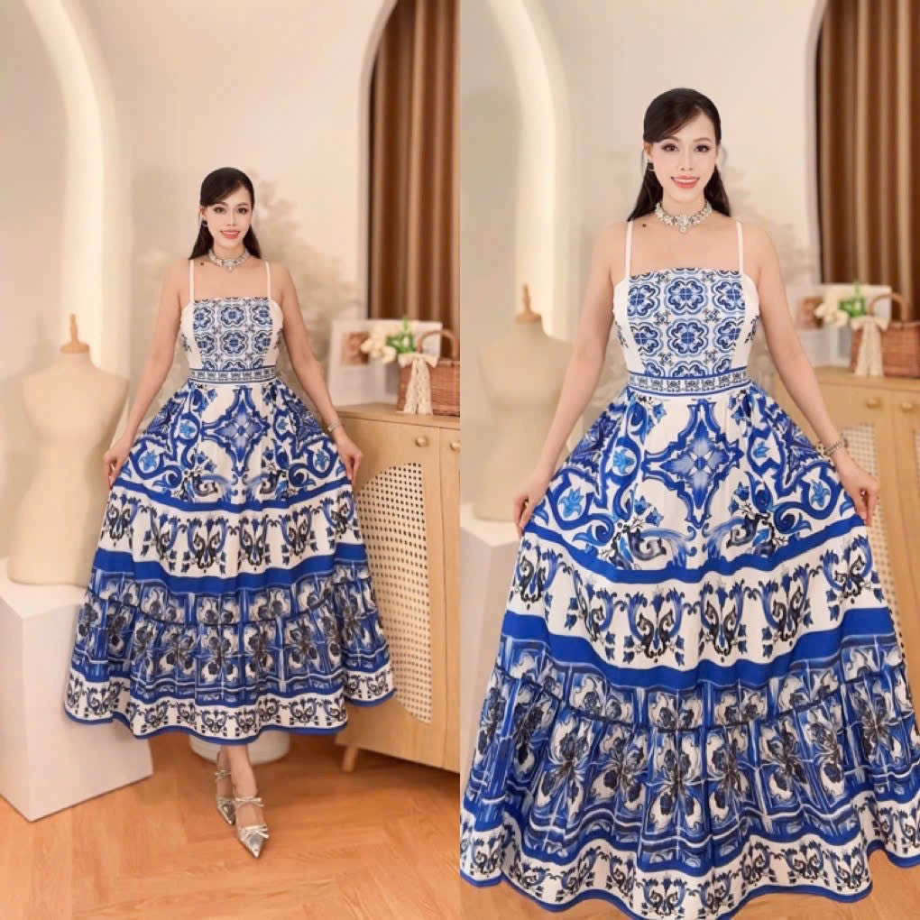 Vietnam Blue Tile Print Spaghetti Strap Tiered Maxi Dress worn by a model, showcasing its elegant design and vibrant pattern.