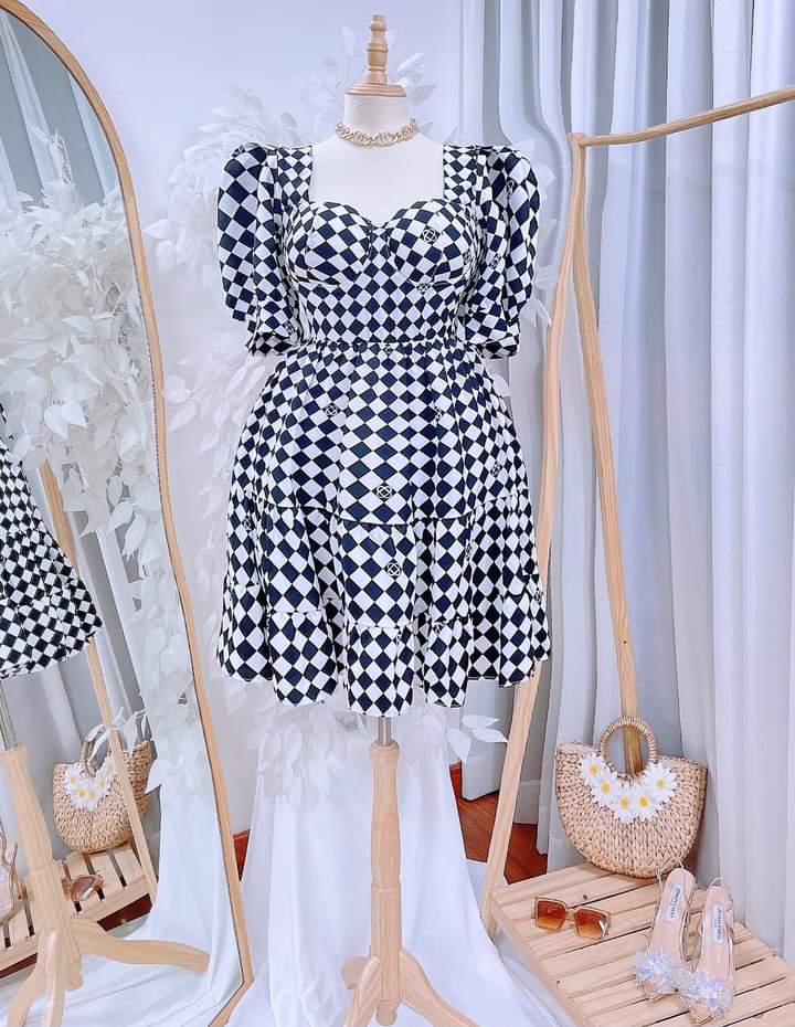 Vietnam Ao Dai Puff Sleeve Statement Harlequin Mini Dress displayed on mannequin with black-and-white checkered pattern.